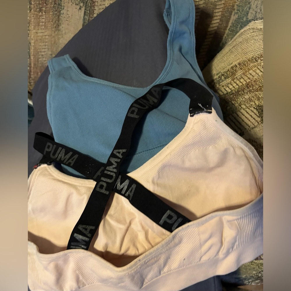 Puma and blue sports bras, both. Small and medium, no wire, pad adjustable strap